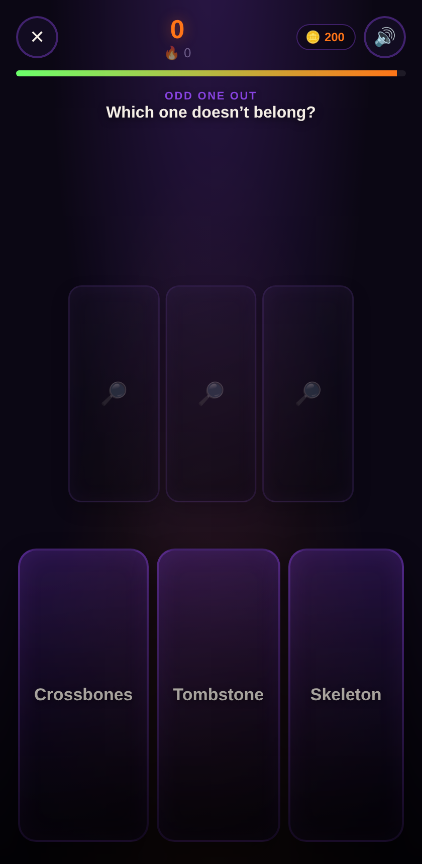 Odd One Out gameplay screen showing three Halloween objects — Crossbones, Tombstone and Skeleton — with the prompt 'Which one doesn't belong?'